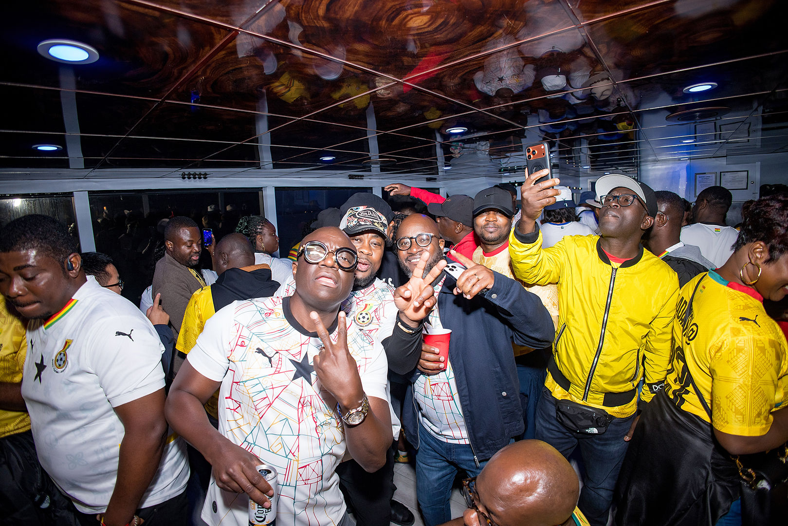 Black Stars fans dancing and celebrating together