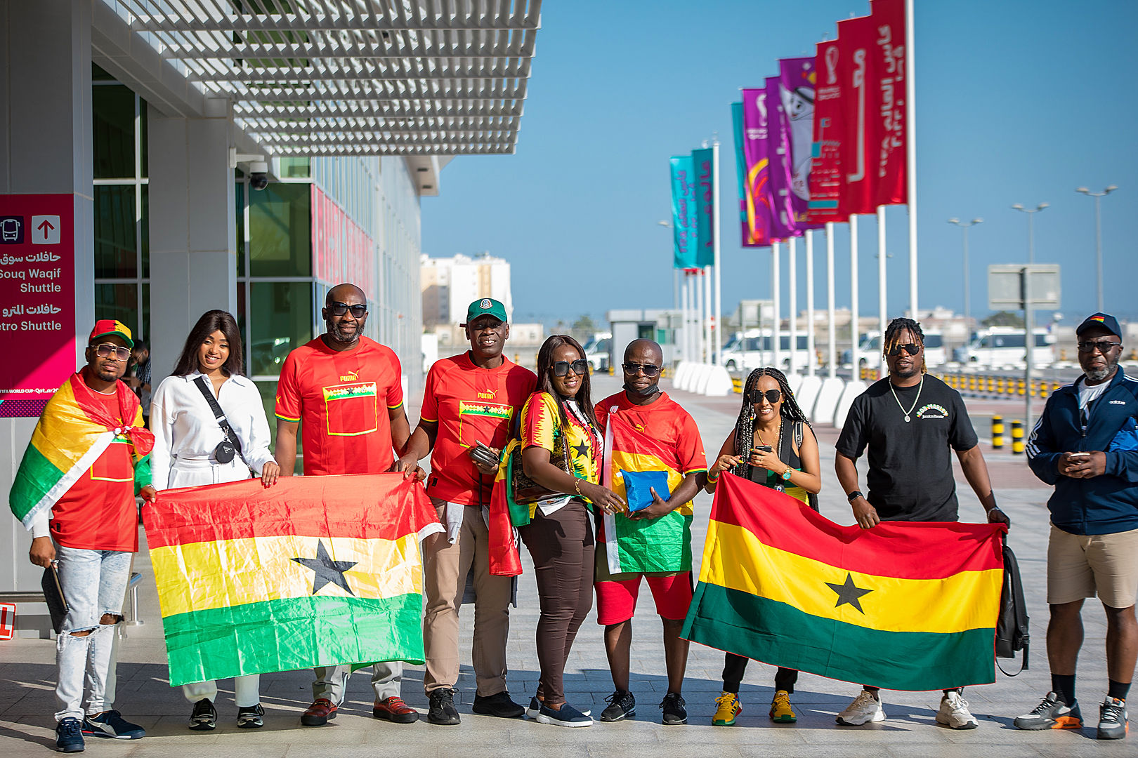 Fans with flags at stadium